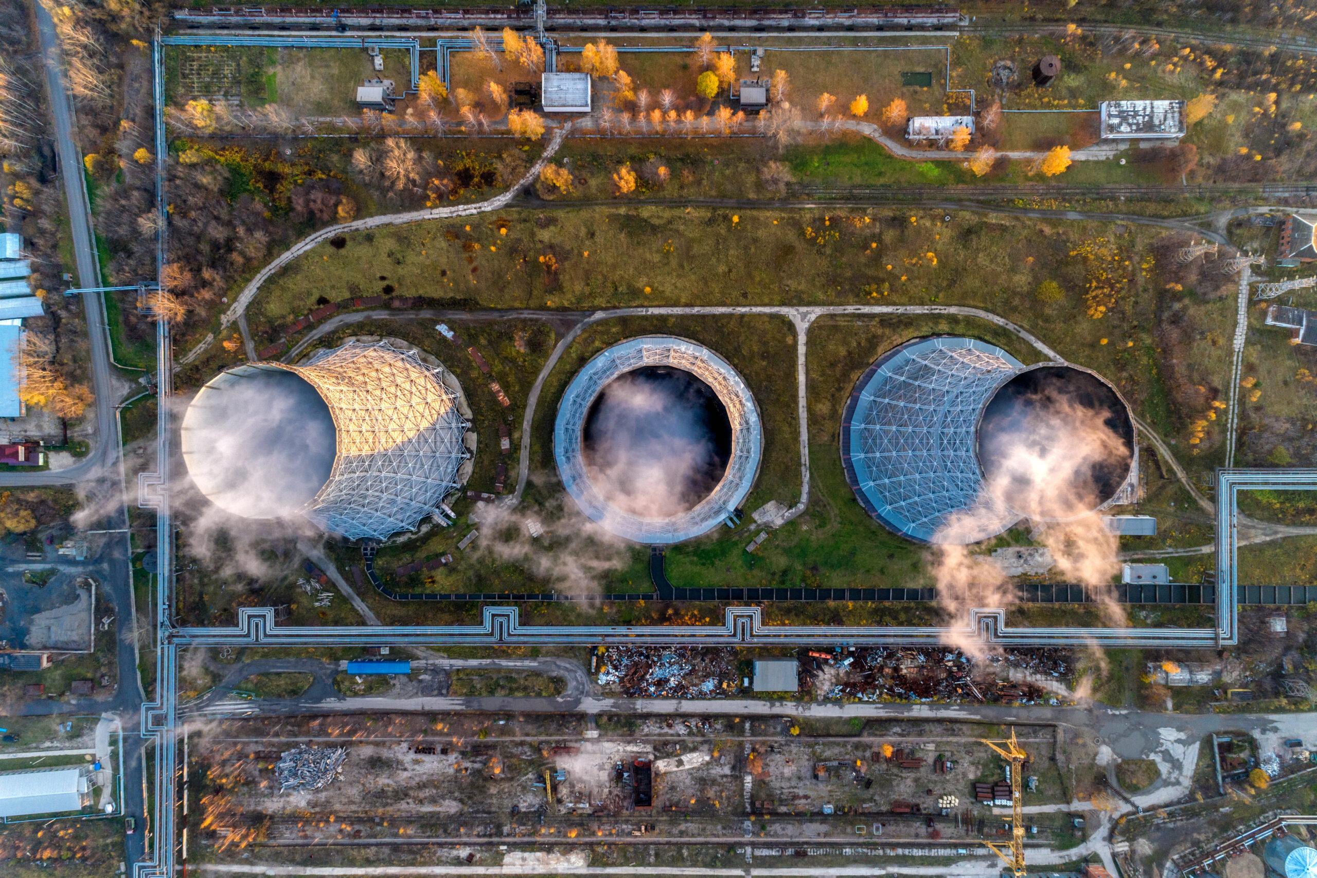 Aerial view of three nuclear power plant cooling towers.