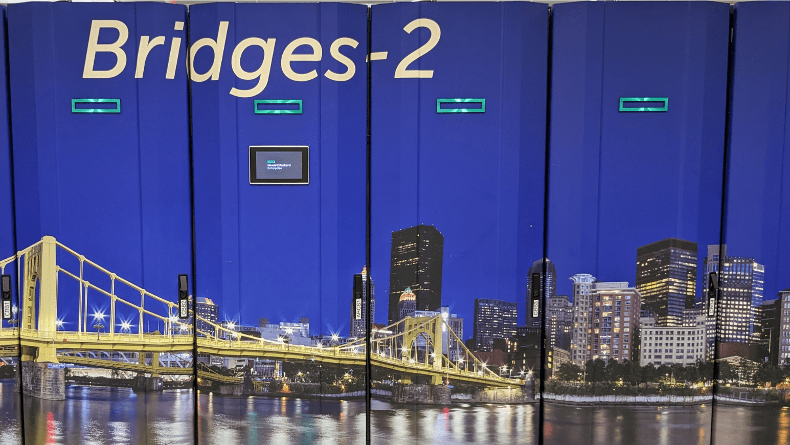 Image of Bridges-2 cabinets, with a colorful wrap depicting Pittsburgh bridges.
