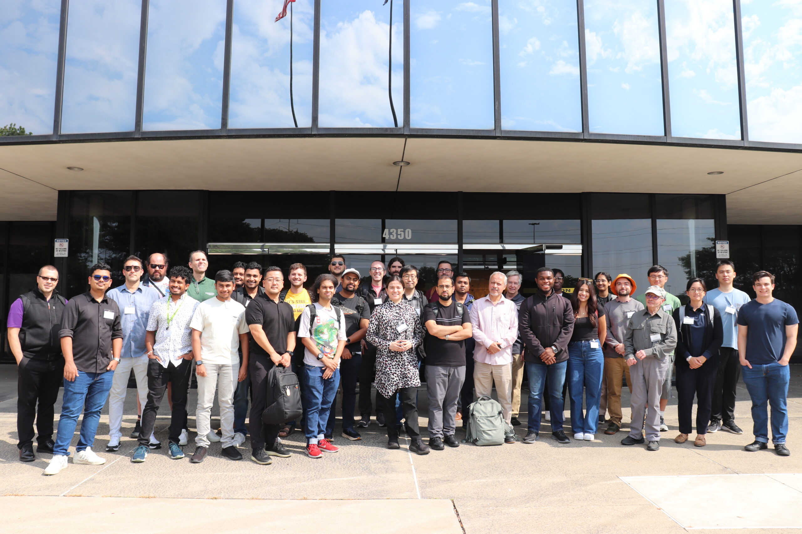 A group of 30+ people pose for the ByteBoost summer workshop