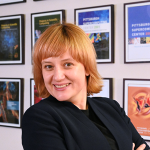 A person with light skin tone and auburn-blonde hair.