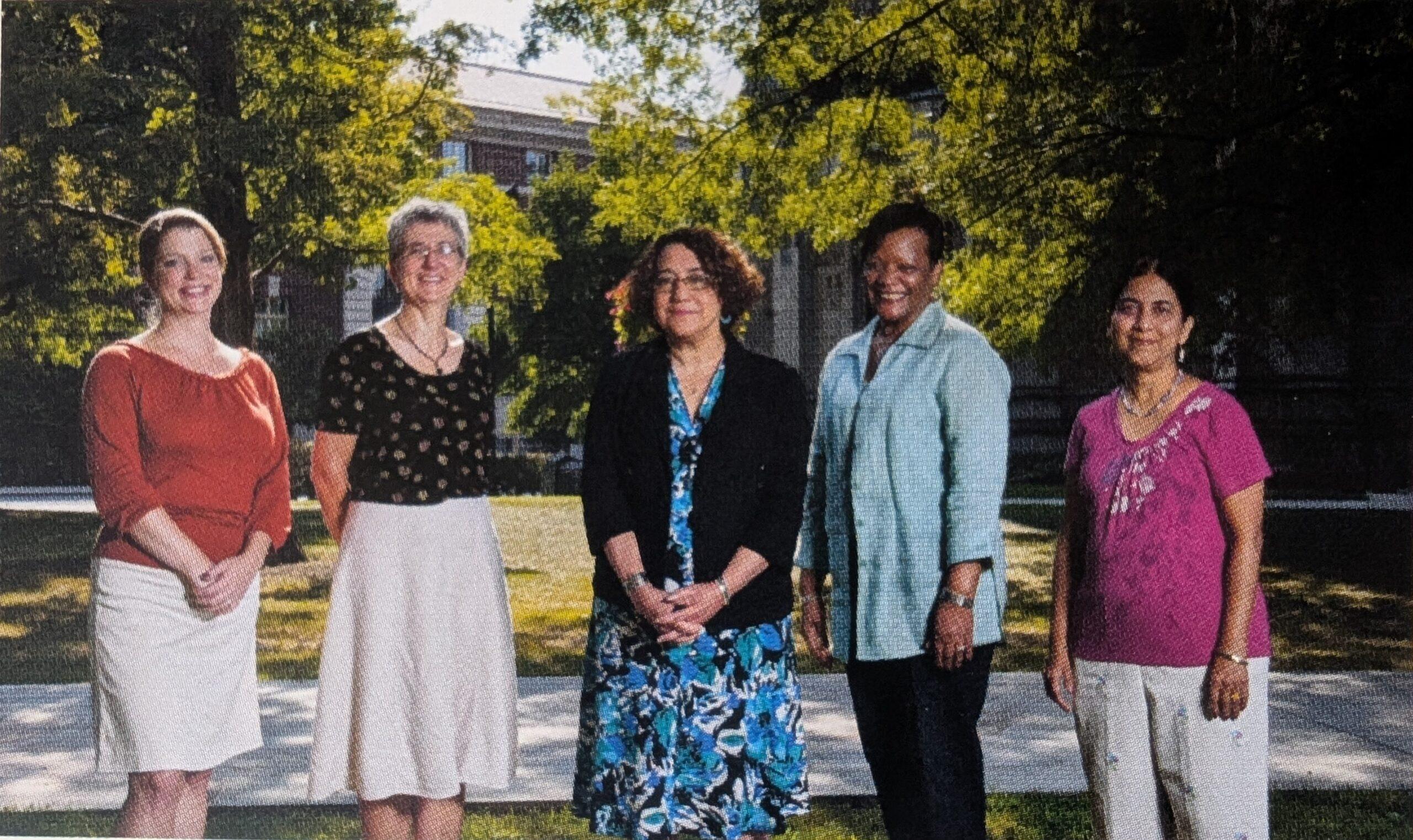 A group photo of 5 women. Among them is Robin Scibek.