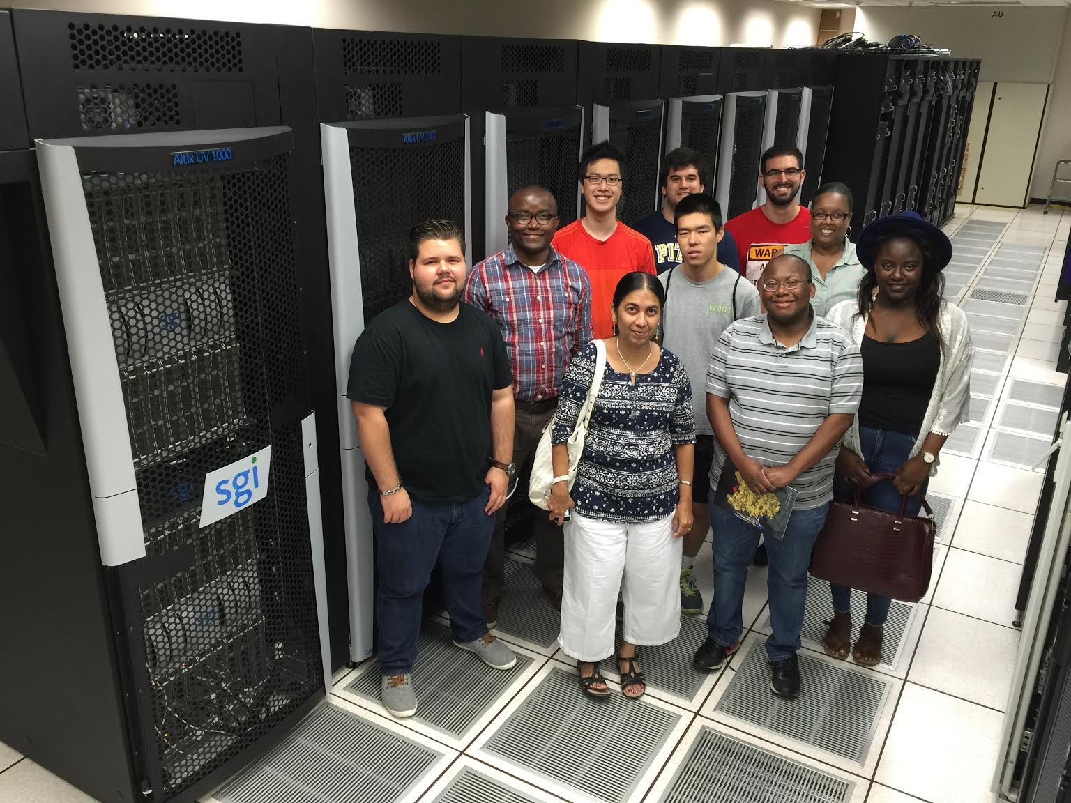 Group of interns in the machine room.