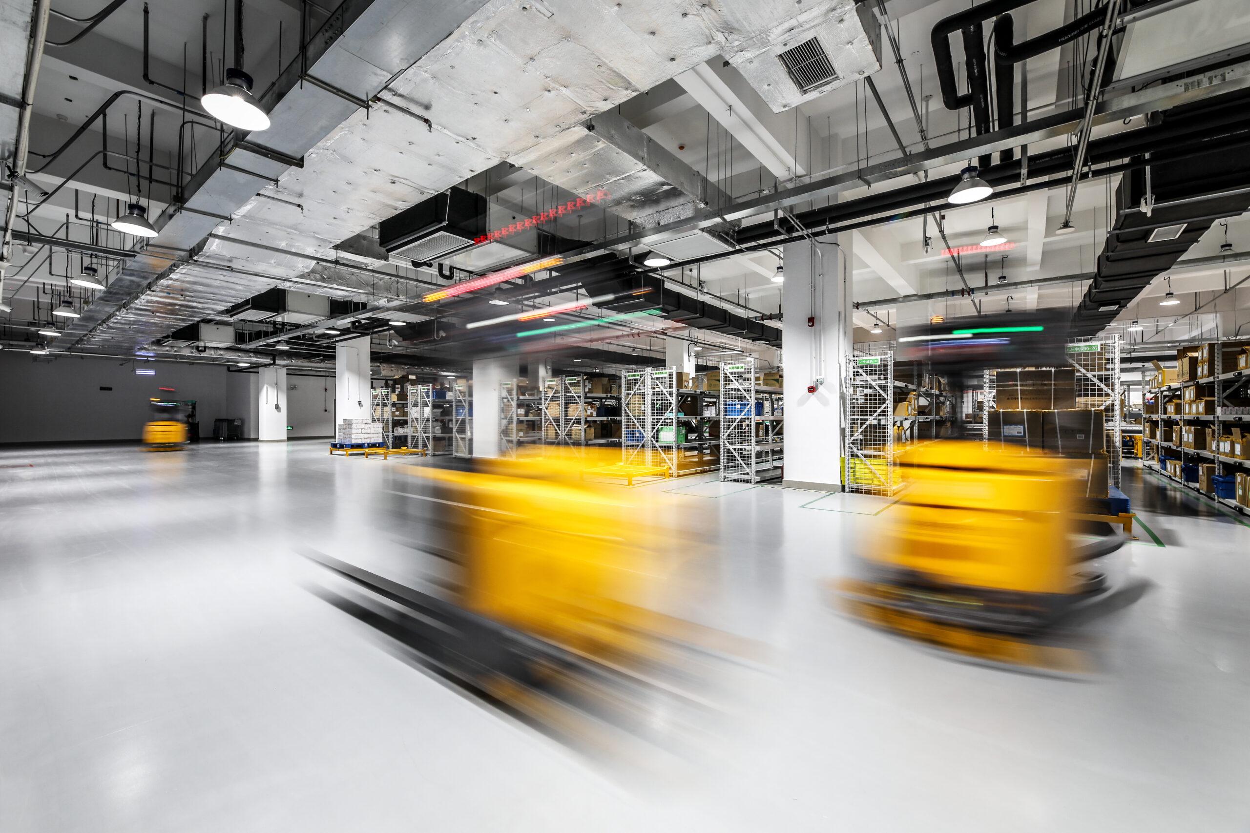 Robots in motion at a warehouse